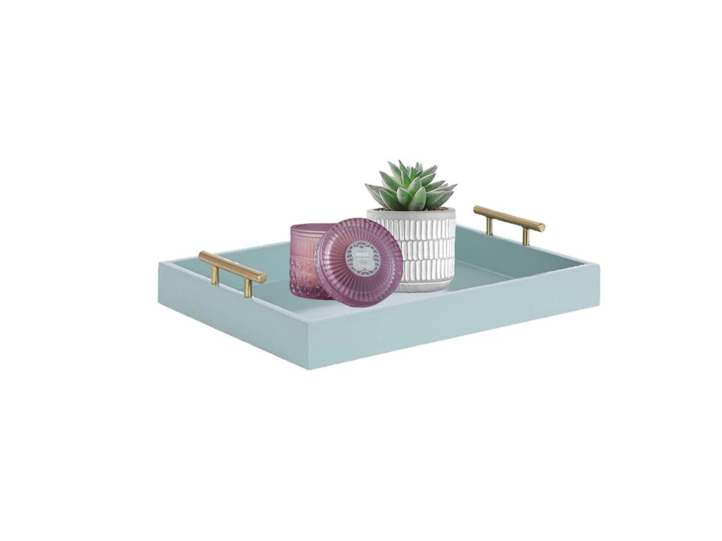 Decorative tray with a candle and succulent.